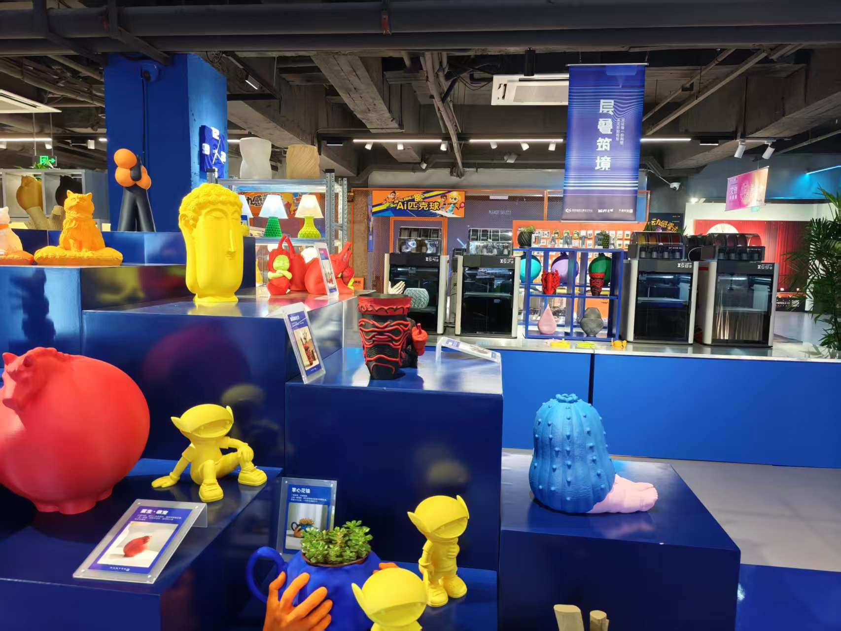 PalX exhibition booth and 3D printers